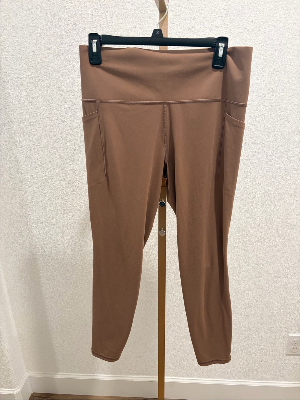 Athleta Salutation stash high-Waist Pocket Leggings in Brown size medium